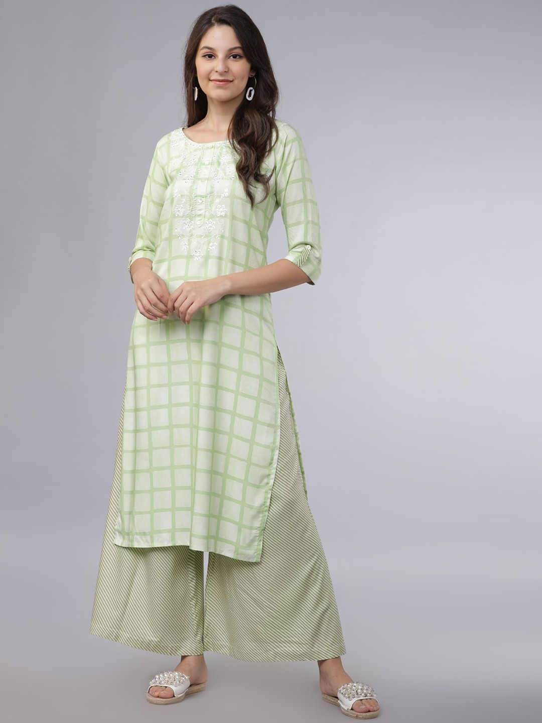 

Vishudh Women Green Ethnic Motifs Regular Thread Work Kurta with Palazzos