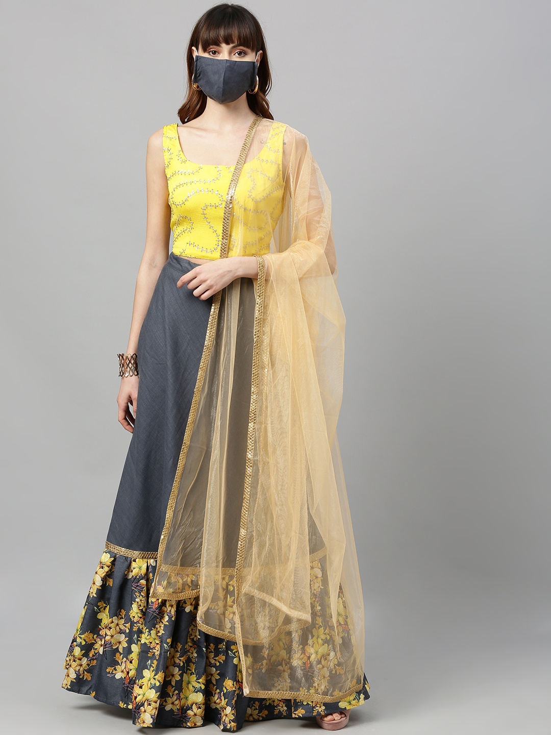 

Ethnovog Yellow Grey Embroidered Made to Measure Lehenga Choli