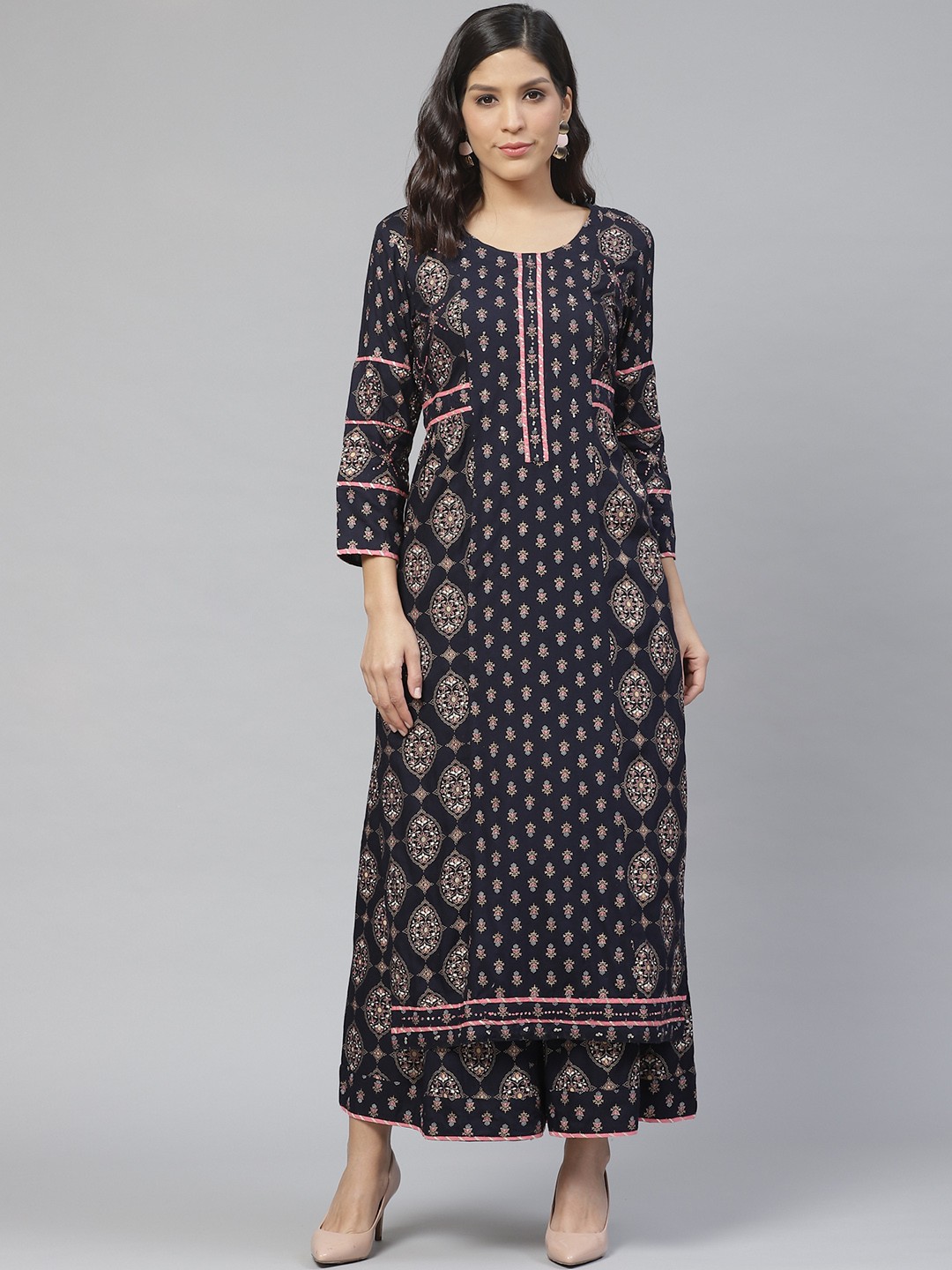 

Ishin Women Navy Blue & Golden Ethnic Printed Kurta with Palazzos