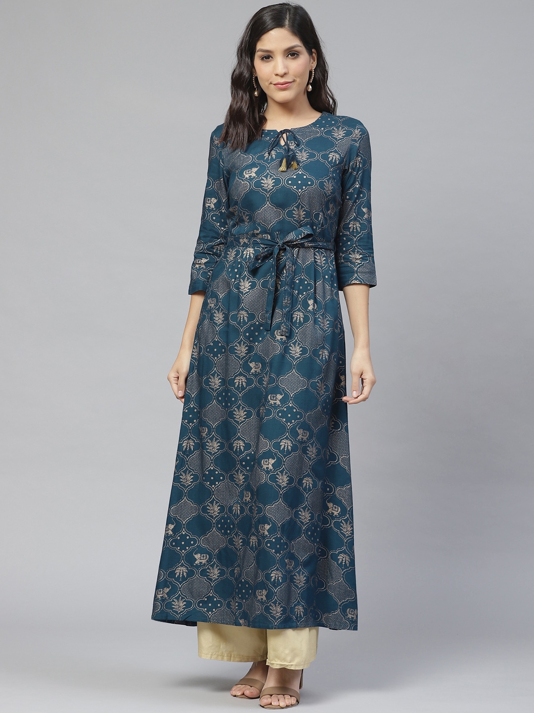 

Ishin Tie-Up Neck Foil Print A-Line Kurta Comes with Belt, Teal