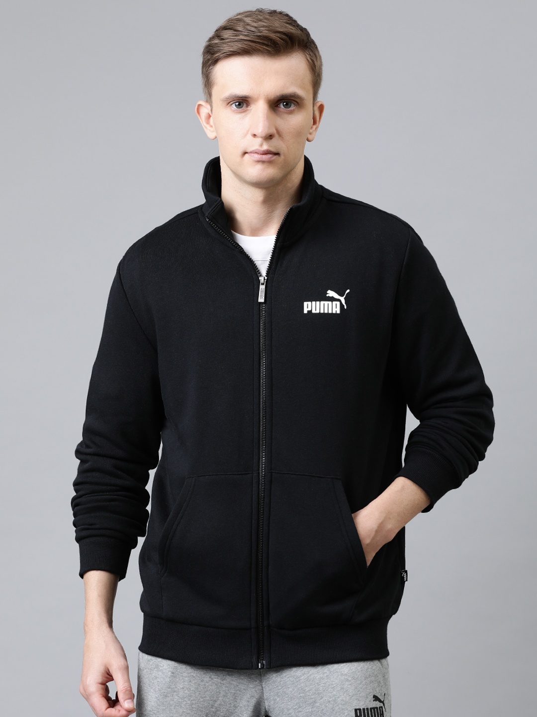 

Puma Men Black Solid ESS Track Track Sweatshirts