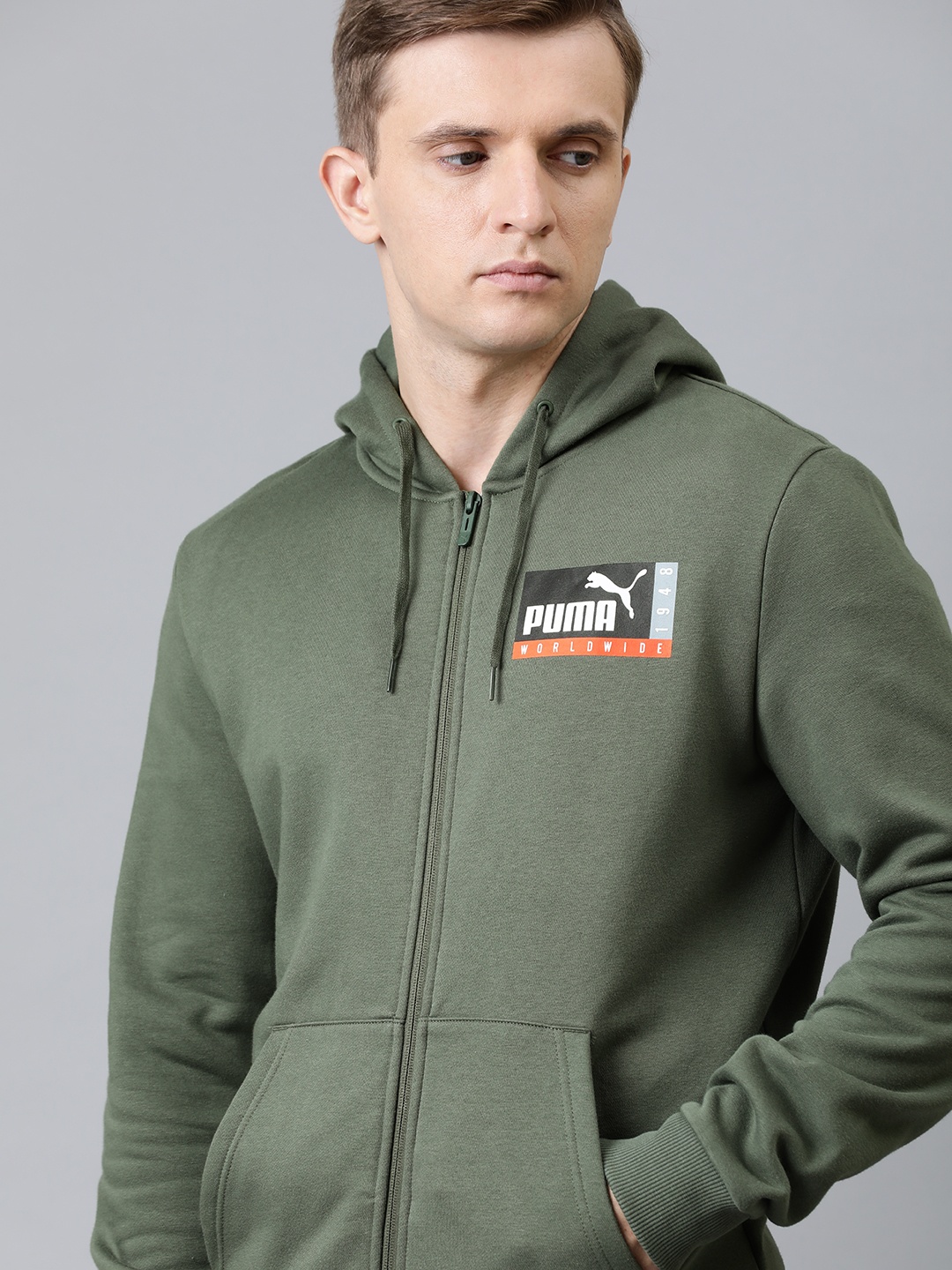 

Puma Men Olive Green Solid Knitted Hooded Sporty Jacket