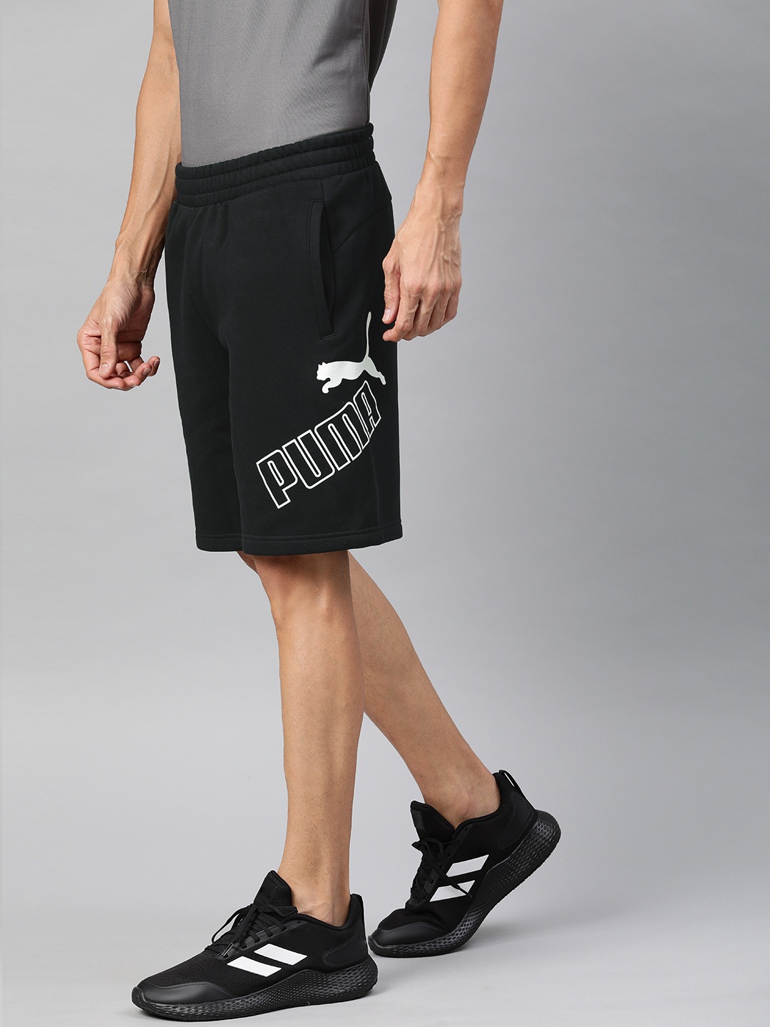 

Puma Men Black Printed Regular Fit Sports Shorts