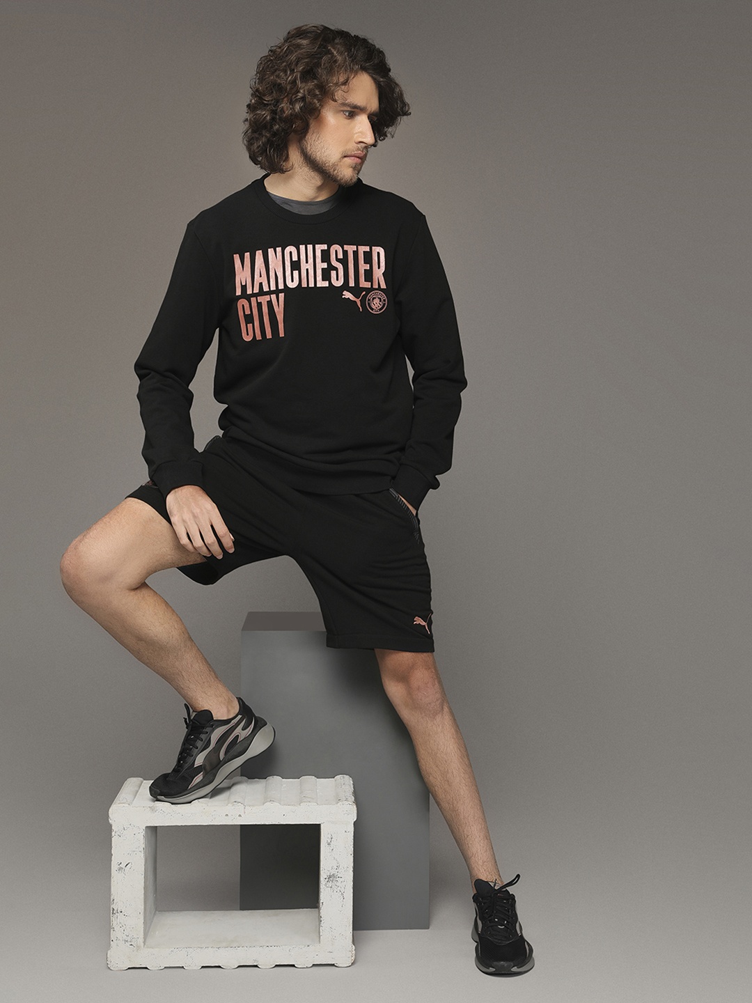 

Puma Men Black Printed MCFC Football Core Wording Football Sweatshirt