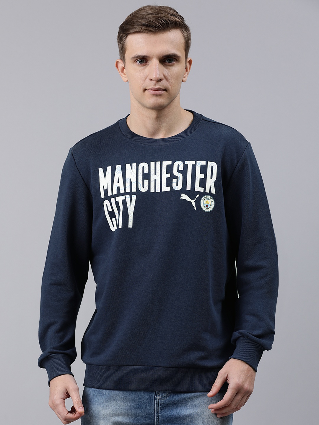 

Puma Men Navy Blue Manchester City ftblCORE Wording Football Sweatshirt