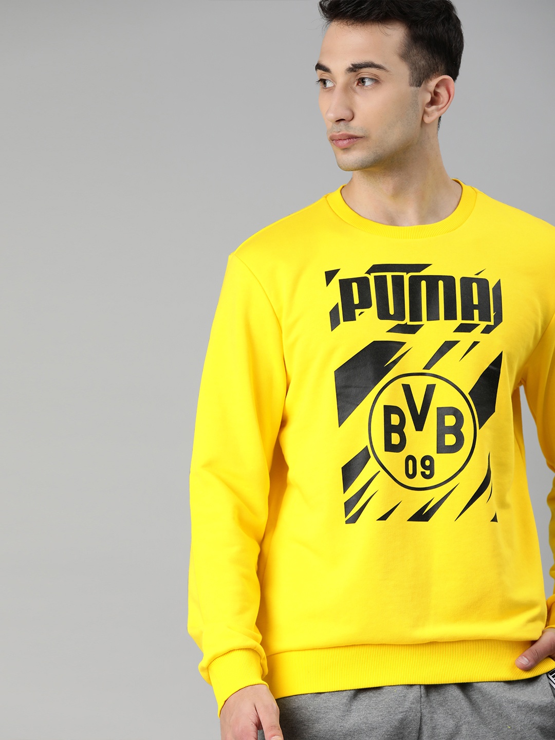 

Puma Men Yellow & Black BVB ftblCore Graphic Printed Football Sweatshirt