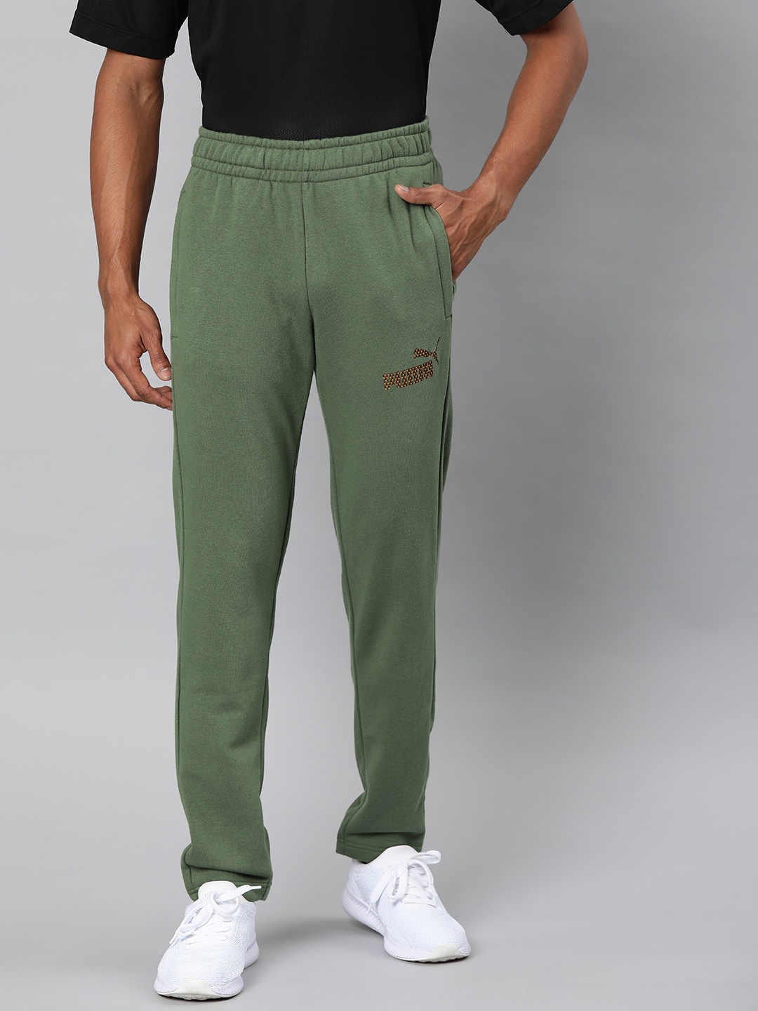 

Puma Men Olive Green Solid Straight Fit Knitted OP 19 Track Pants