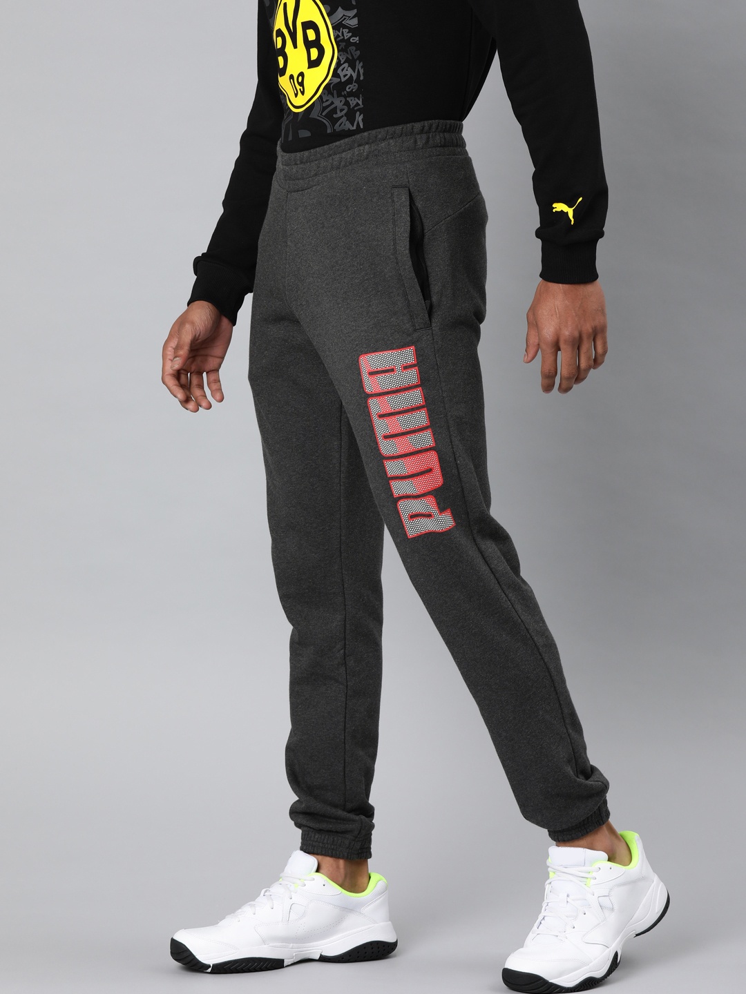 

Puma Men Charcoal Grey Solid Straight Fit Knitted Joggers With Printed Detailing