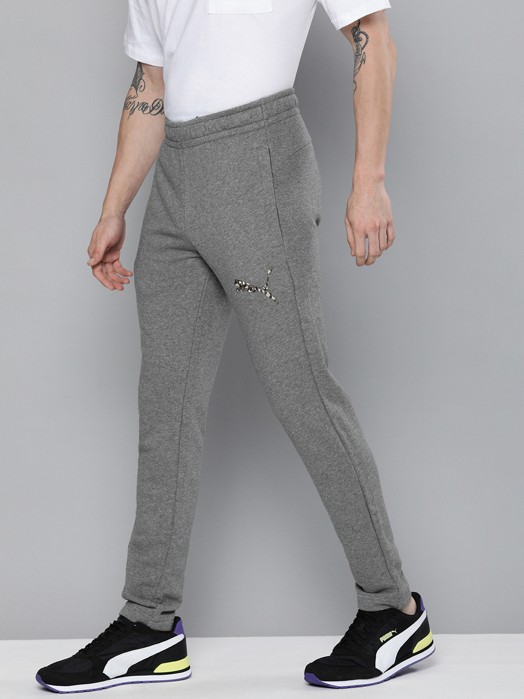 

Puma Men Grey Heather Solid Knitted Track Pants