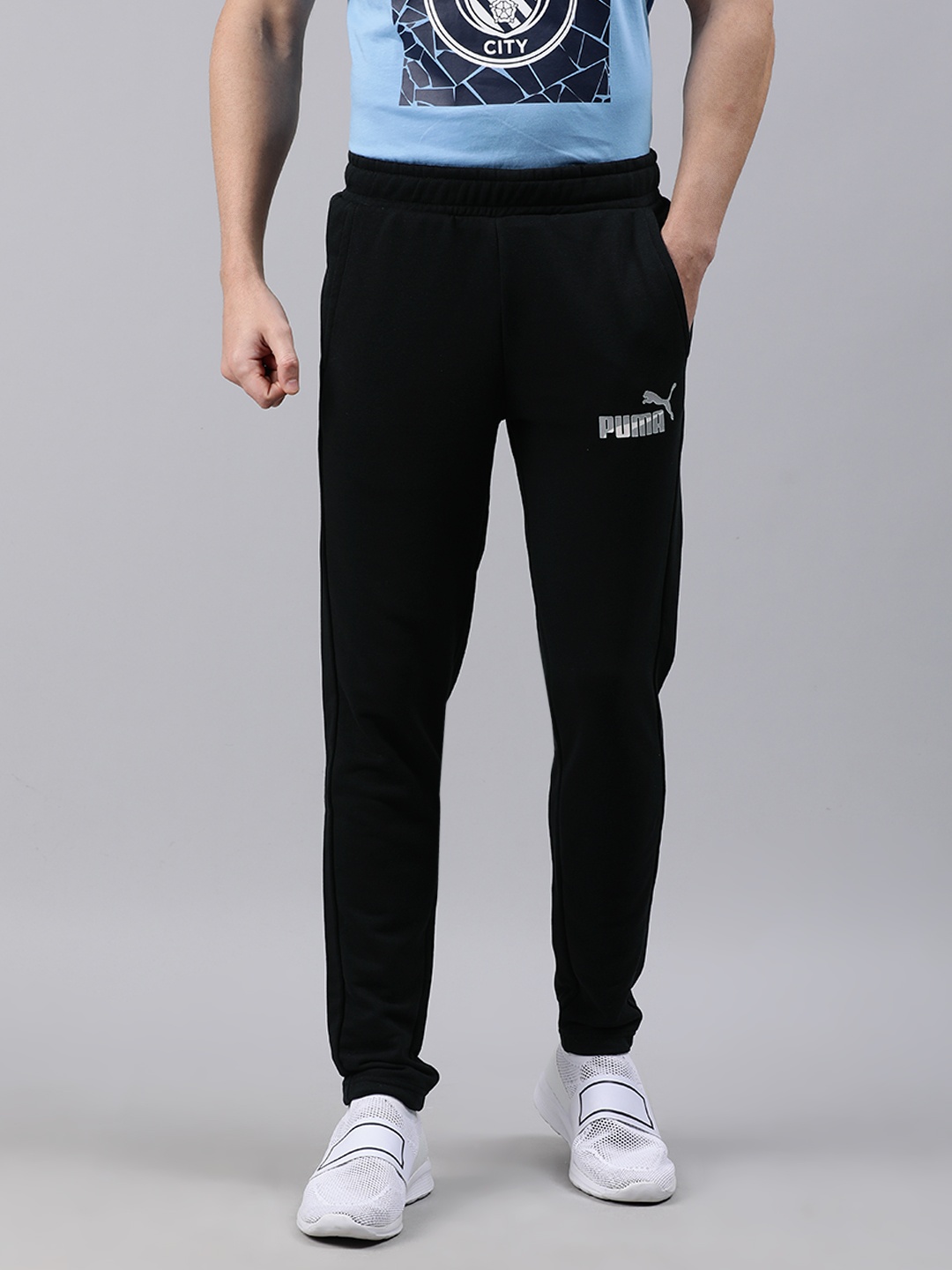 

Puma Men Black Solid Straight Fit Knitted OP 3 Track Pant
