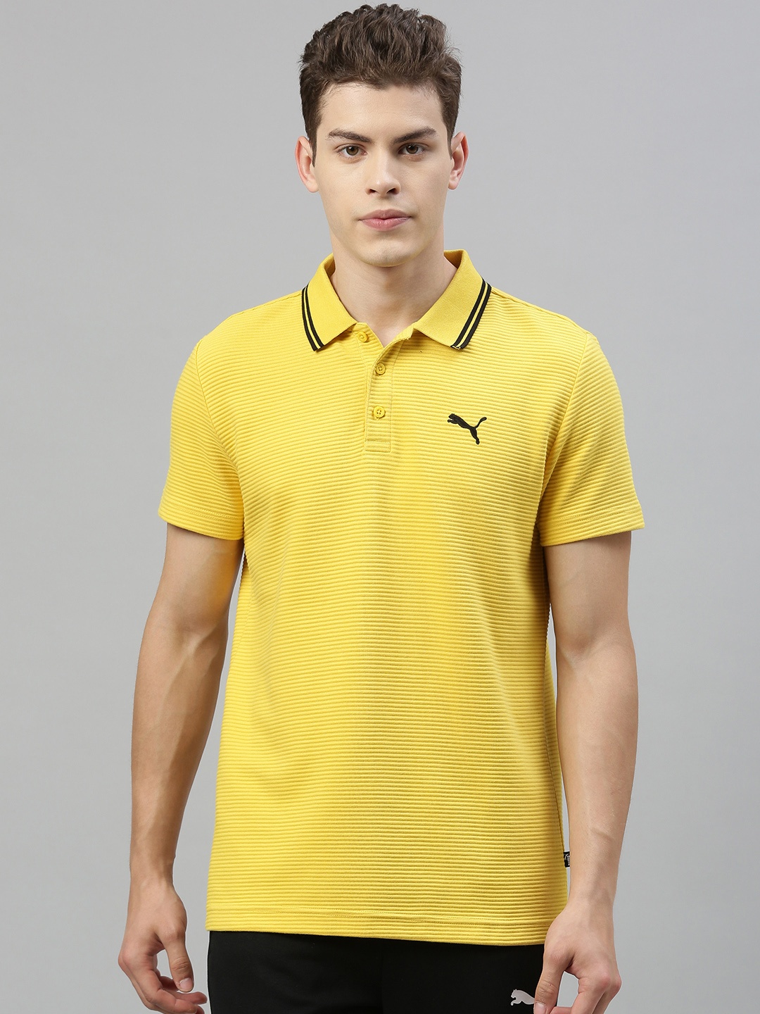 

Puma Men Yellow Solid Polo Collar T-shirt