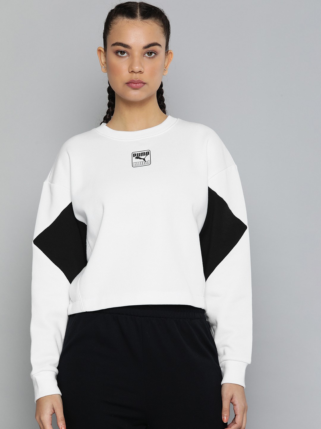 

Puma Women White Solid Rebel Crew Sweatshirt With Brand Logo Detail