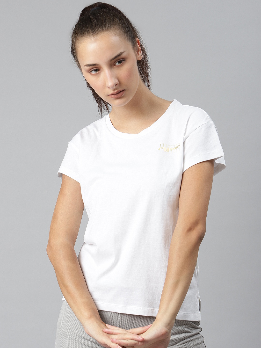 

Puma Women White Pure Cotton Solid Round Neck Tee II