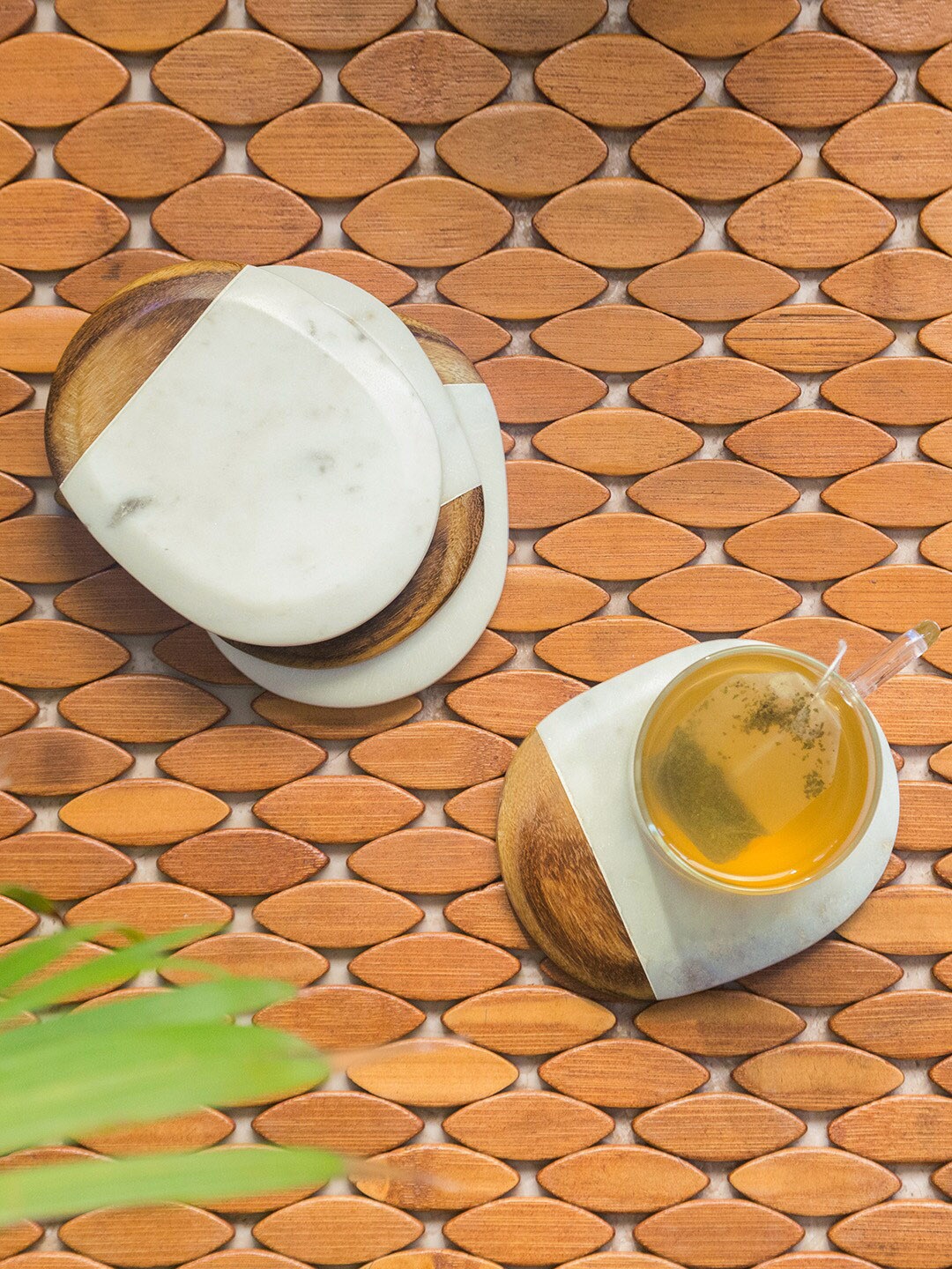 

ExclusiveLane Set of 4 White & Brown Mango Wooden Marble Fused Elliptical Coasters