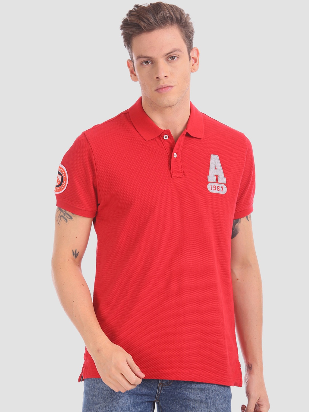 

Aeropostale Men Red Solid Polo Collar T-shirt