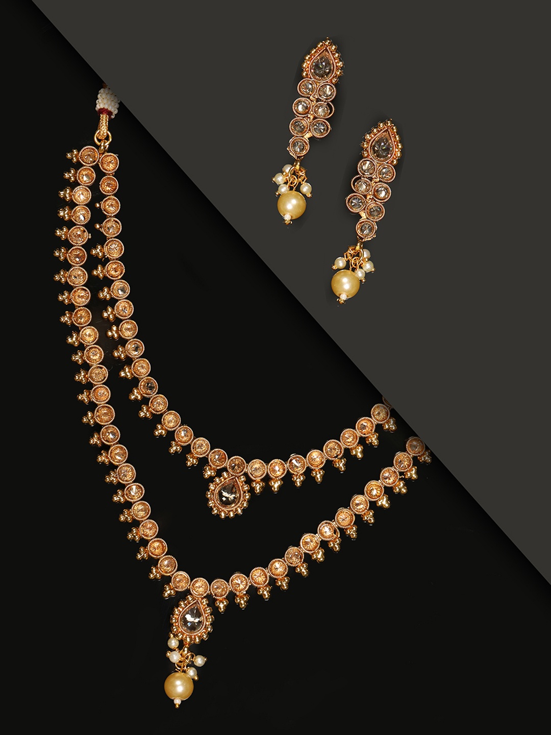 

Priyaasi Gold-Plated Stone Studded & Beaded Handcrafted Jewellery Set