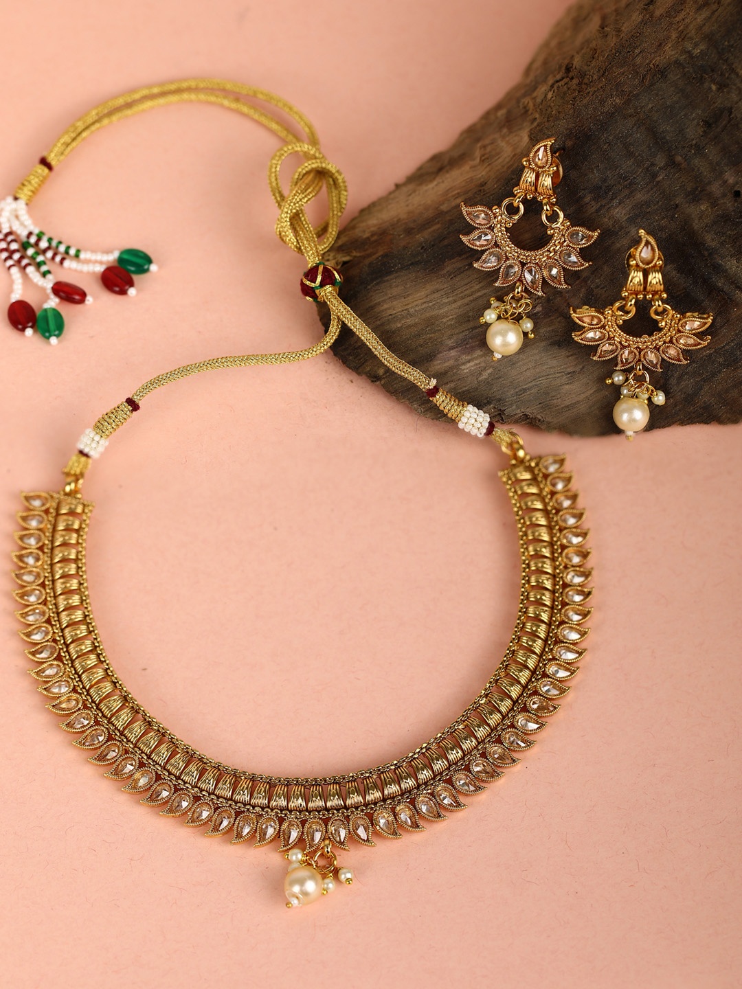 

Priyaasi Off-White Gold-Plated Stone-Studded & Beaded Handcrafted Jewellery Set