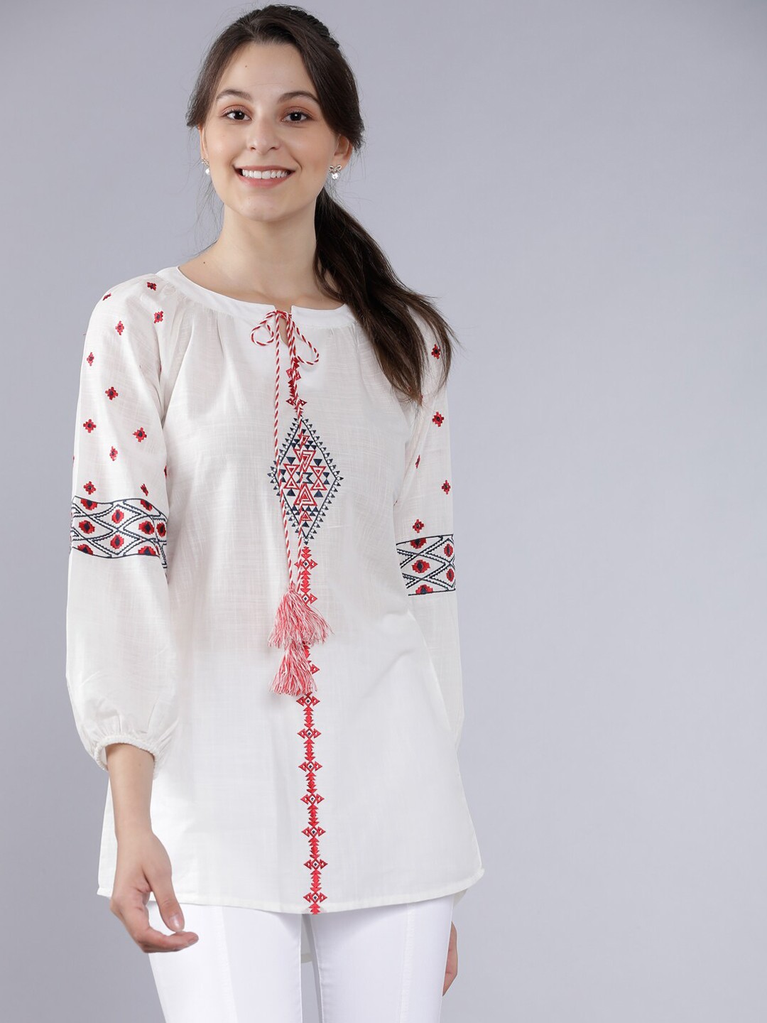 

Vishudh Women's White & Navy Blue Embroidered Tunic