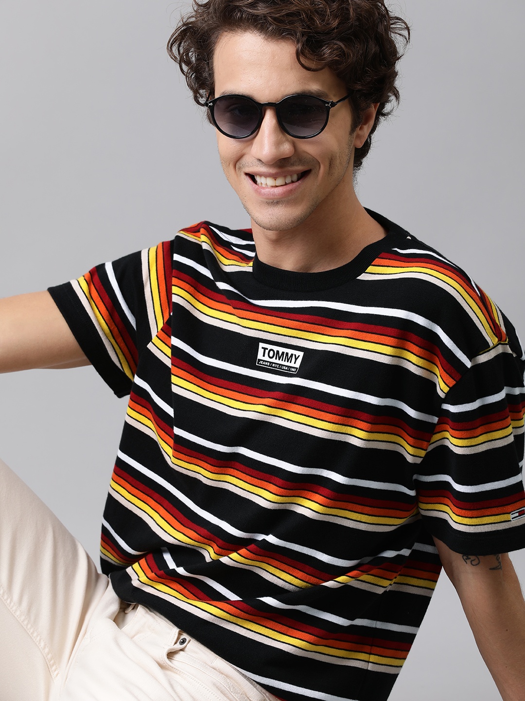 

Tommy Hilfiger Men Black Yellow Striped Round Neck Pure Cotton T-shirt