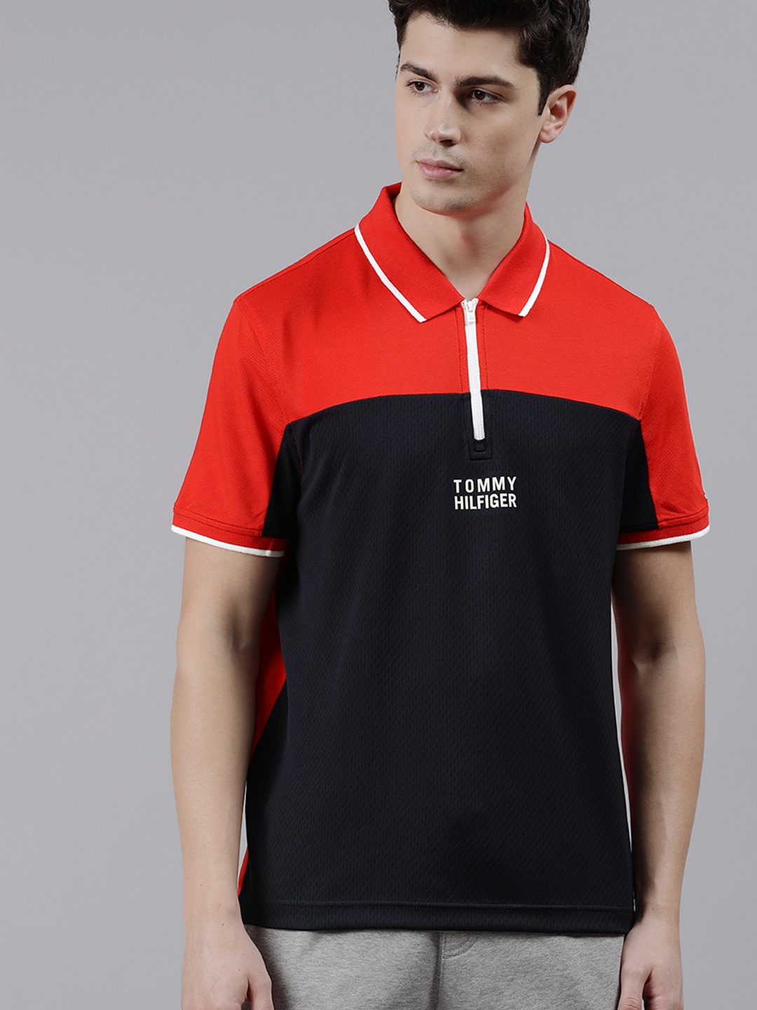 

Tommy Hilfiger Men Red & Black Colourblocked Polo Collar T-shirt