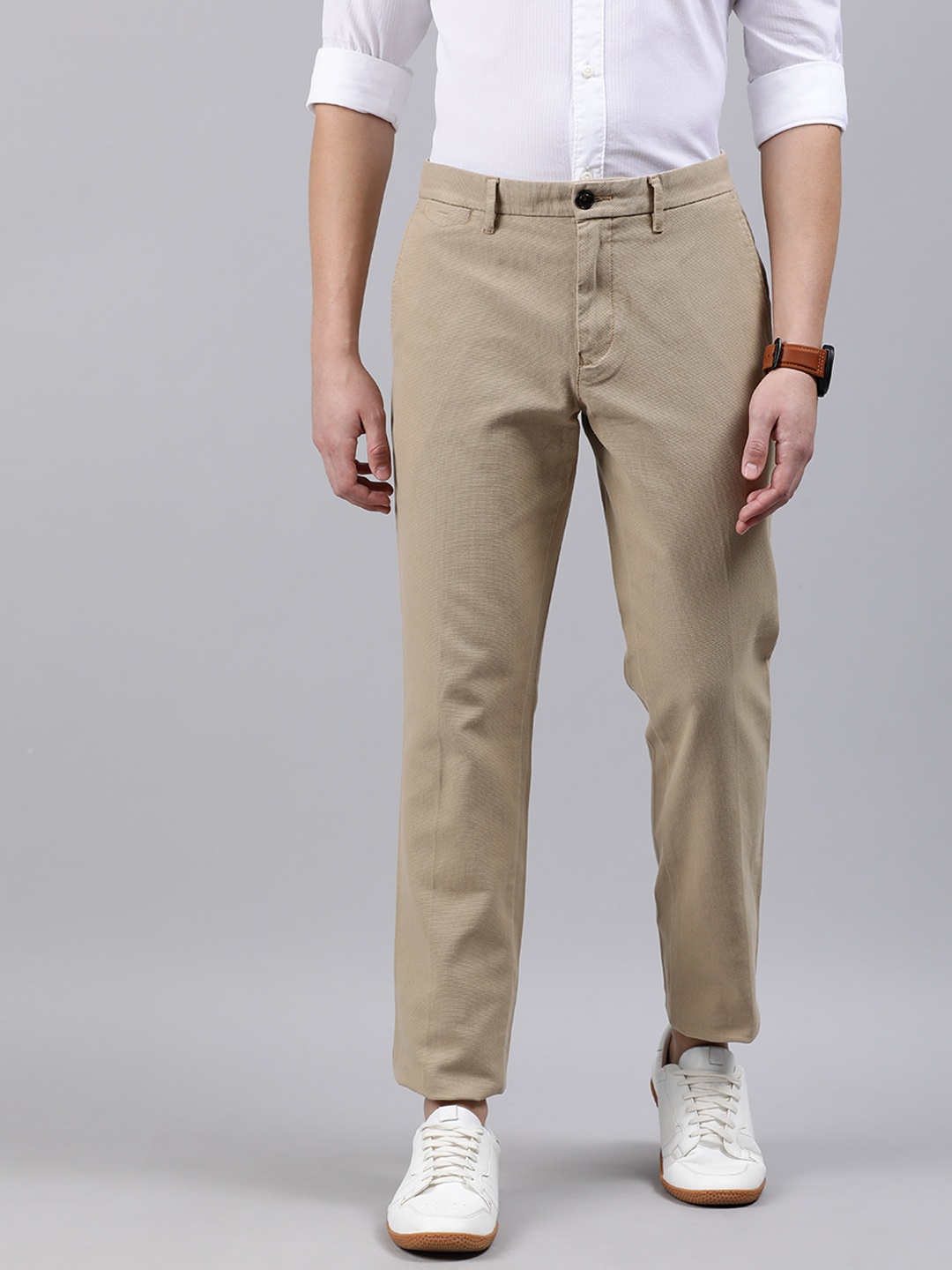 

Tommy Hilfiger Men Khaki Brown Self Design Chinos