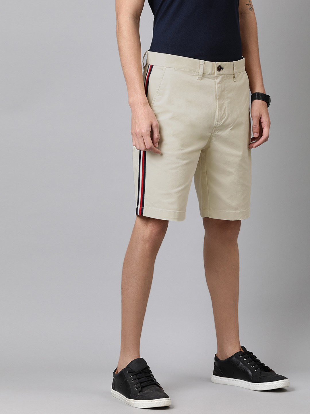 

Tommy Hilfiger Men Off-White Solid Regular Fit Side Striped Regular Shorts