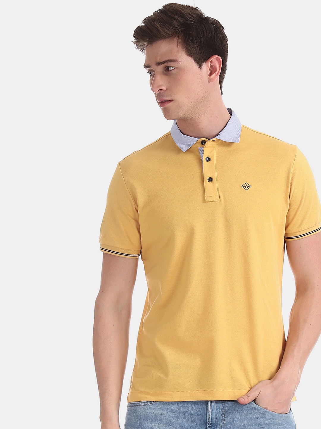 

Arrow Sport Men Mustard Yellow Solid Polo Collar T-shirt