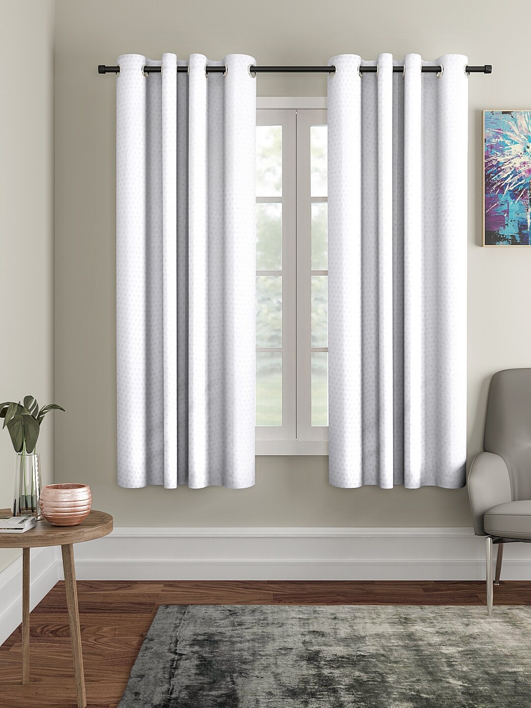 

Cortina White Set of 2 Polka Dots Embossed Plain Polyester Window Curtains