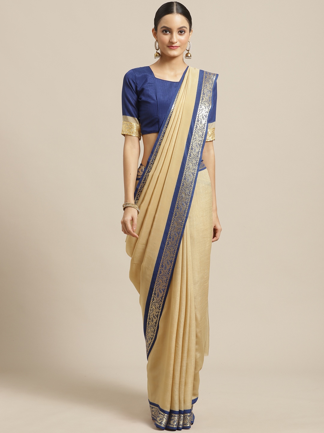 

Saree mall Beige & Blue Solid Saree