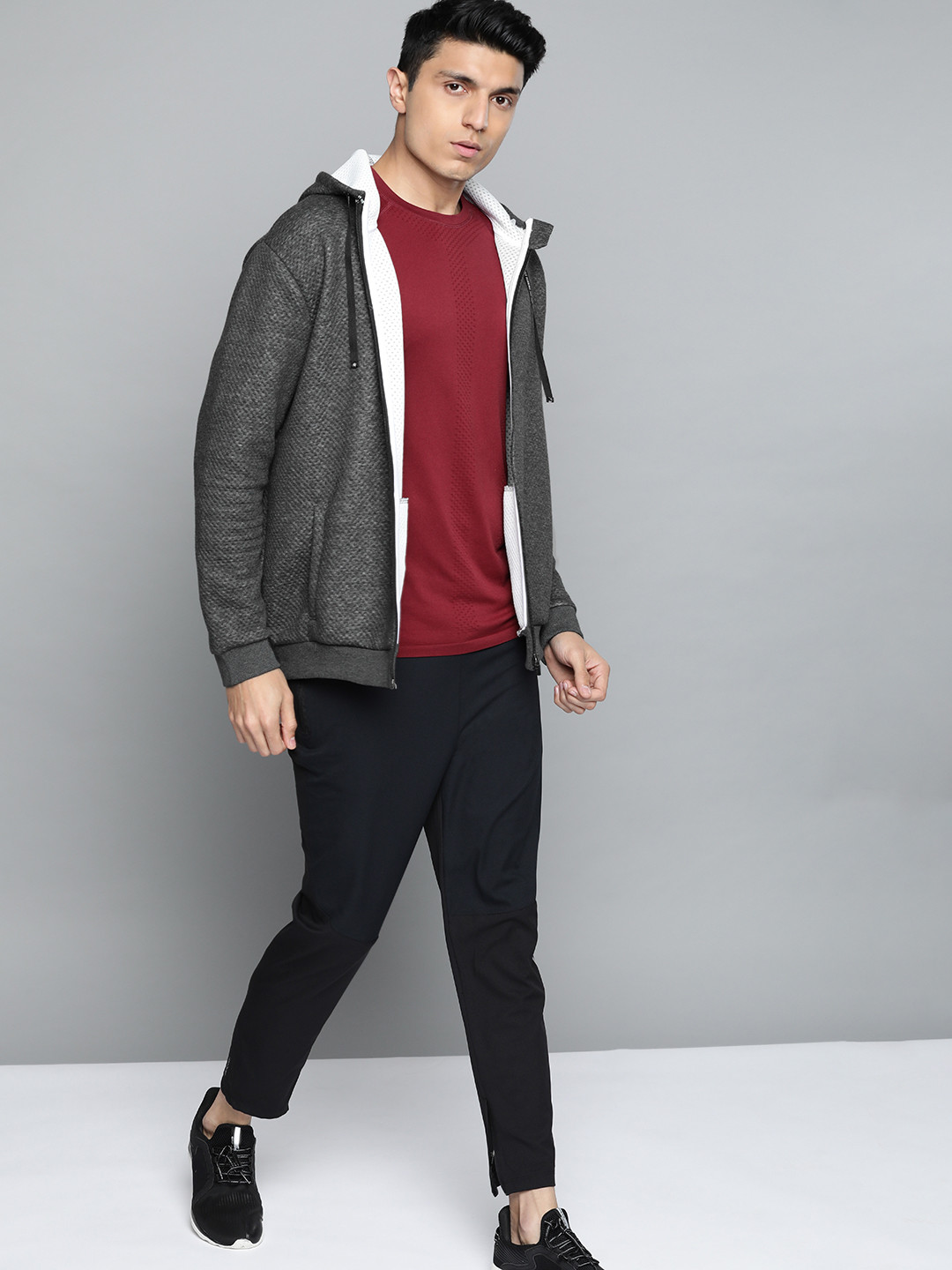 

HRX by Hrithik Roshan Men Anthra Melange Solid Regular Fit Running Sweatshirt, Charcoal