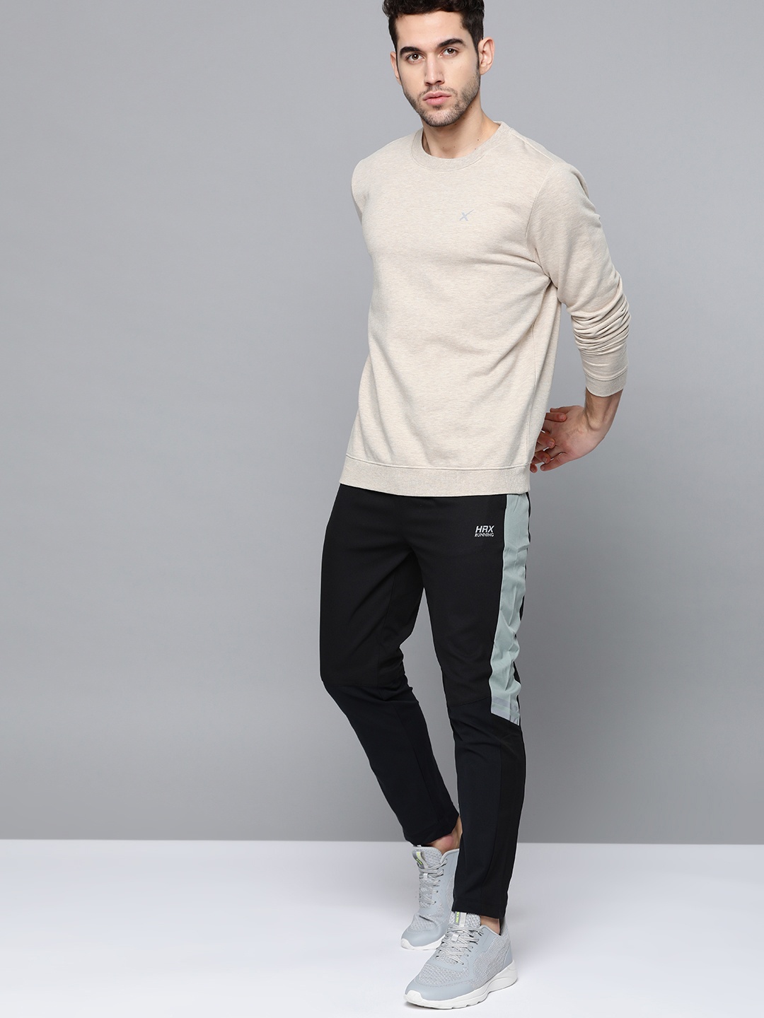 

HRX by Hrithik Roshan Men Off-White Solid Training Sweatshirt