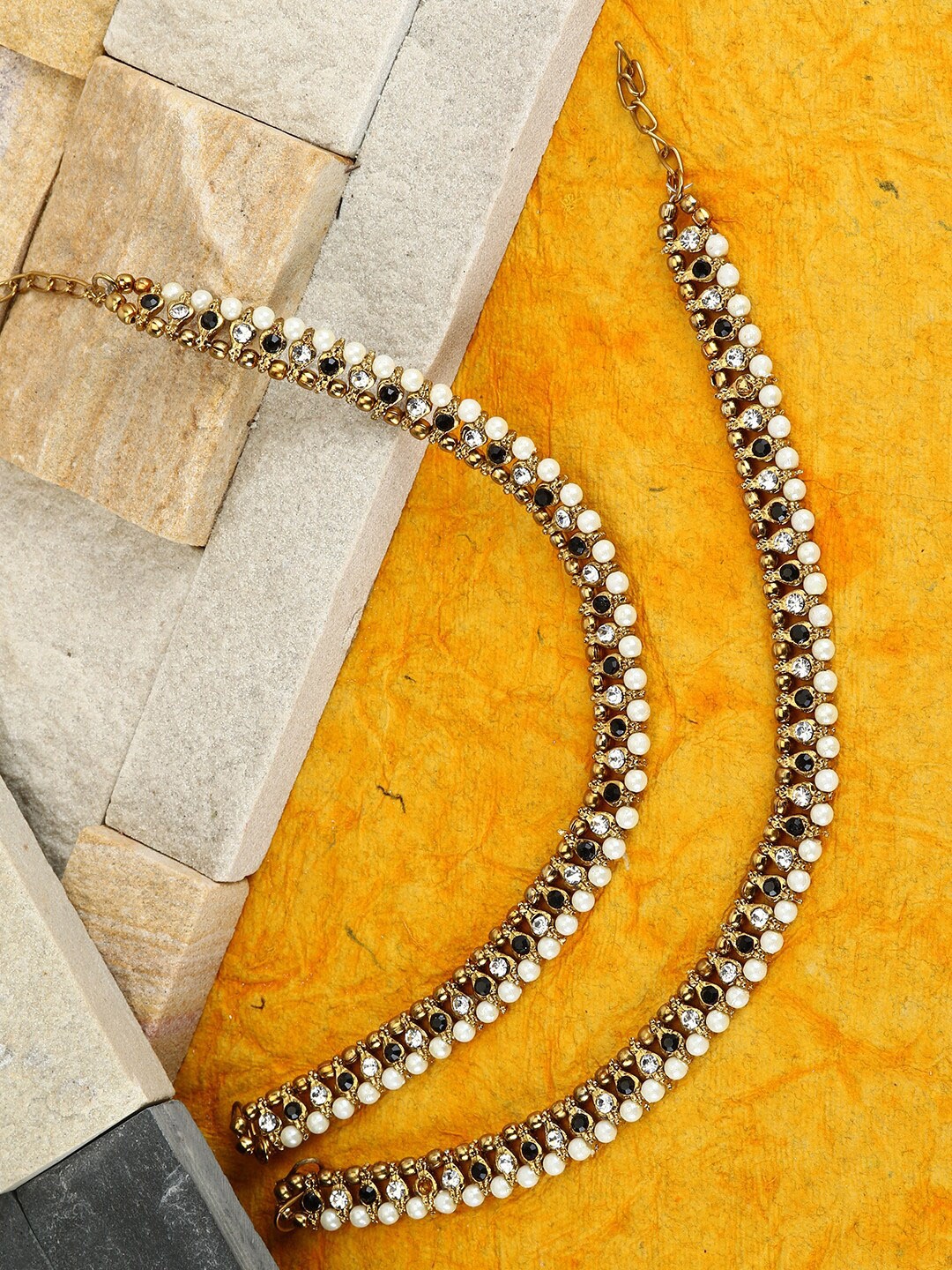 

ANIKAS CREATION Set Of 2 Gold-Plated Black & White Kundan-Studded Beaded Vilandi Anklets