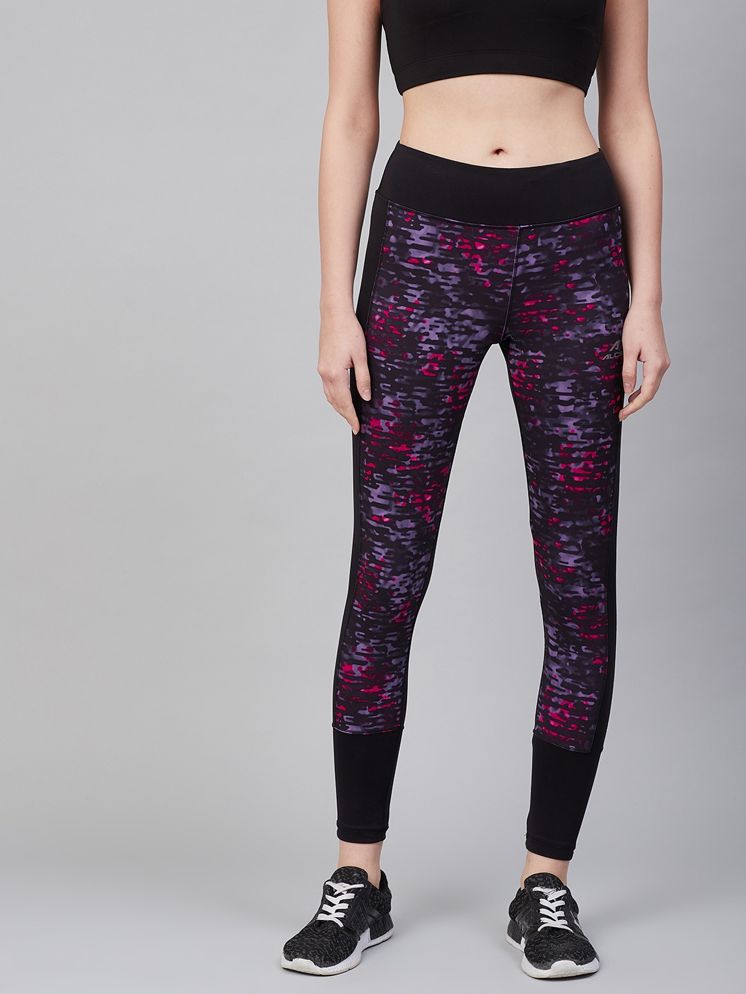 

Alcis Women Black & Purple Printed Training Tights