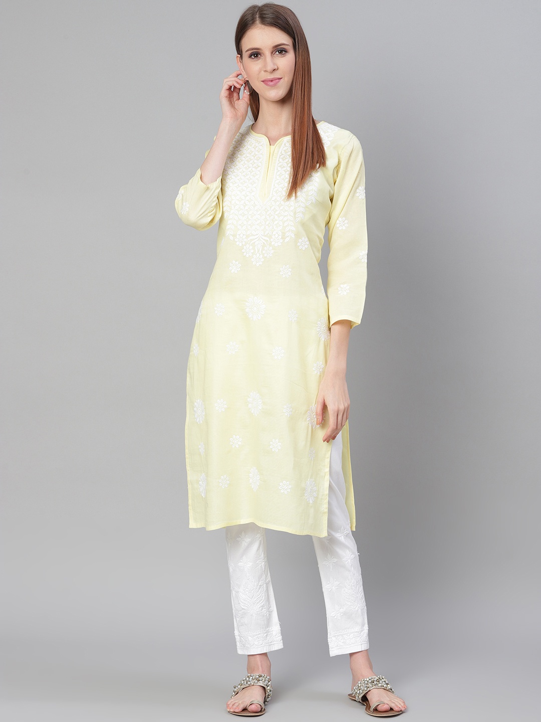

Saadgi Women Yellow & White Chikankari Embroidered Handloom Kurta with Trousers