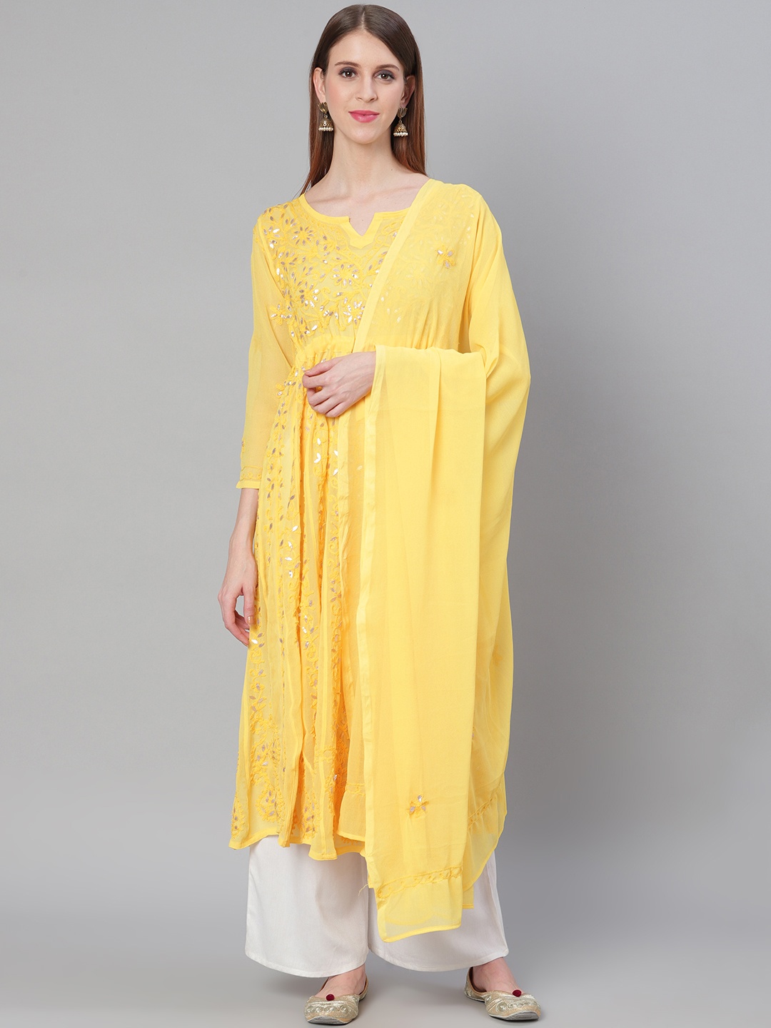 

Saadgi Women Yellow & Golden Handloom Chikankari Embroidered Anarkali Kurta With Dupatta