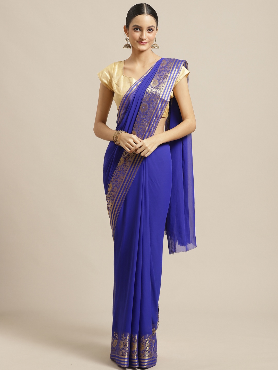 

Saree mall Blue & Golden Solid Saree