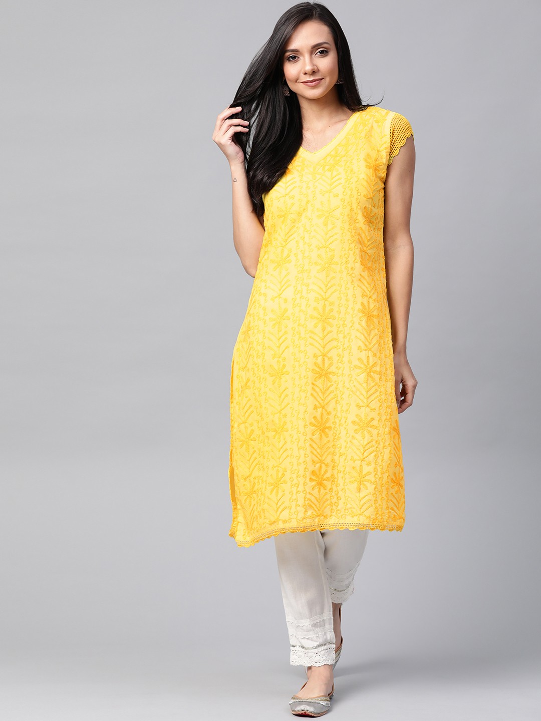 

Saadgi Women Yellow Floral Chikankari Embroidered Handloom Straight Kurta