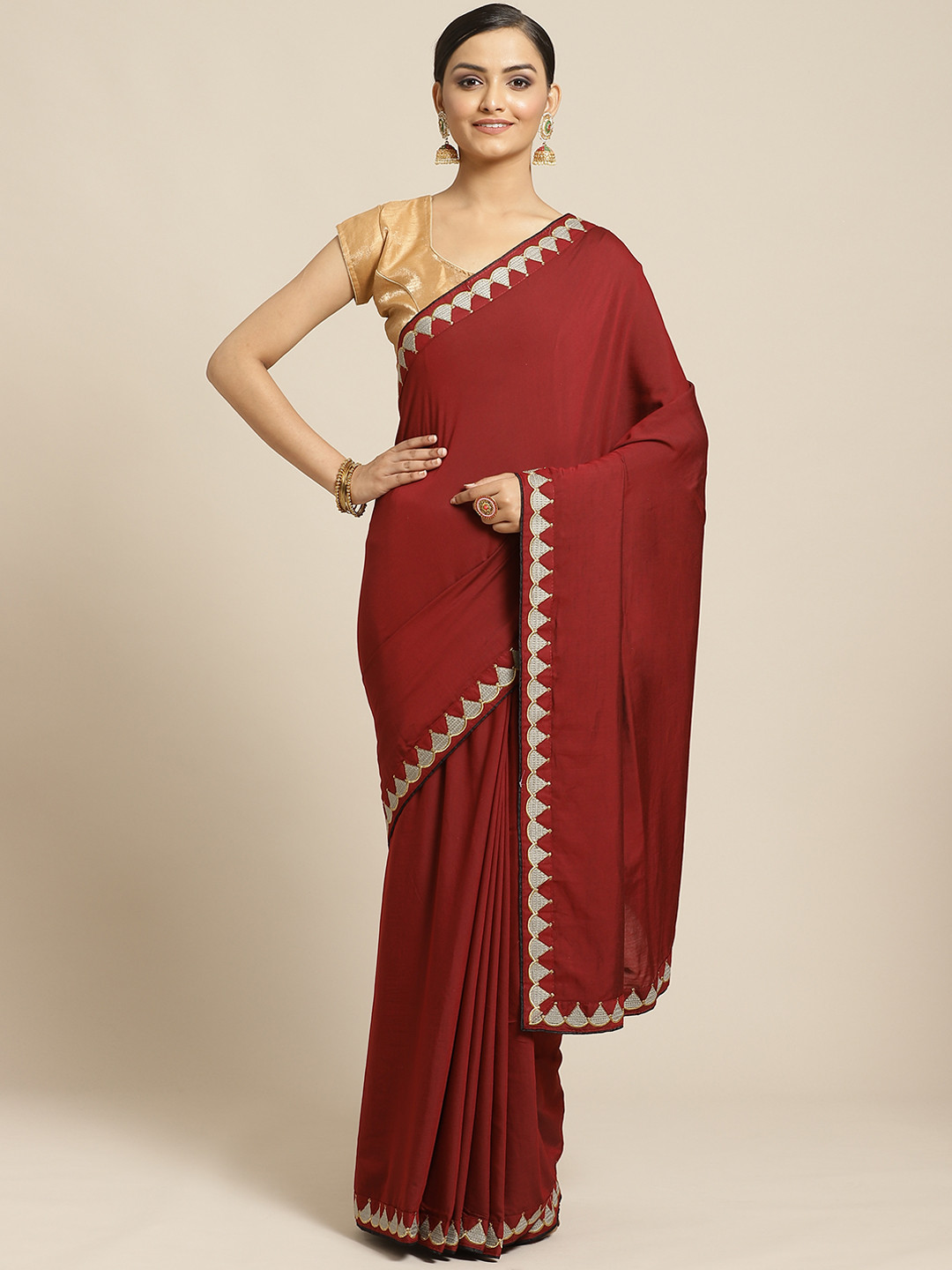 

Shaily Maroon Solid Saree