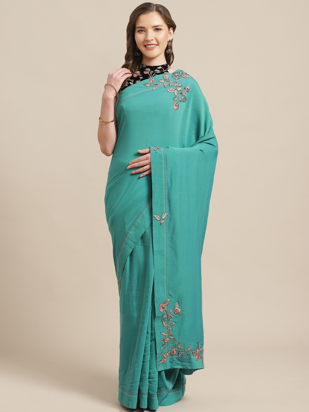 

Shaily Green Solid Saree