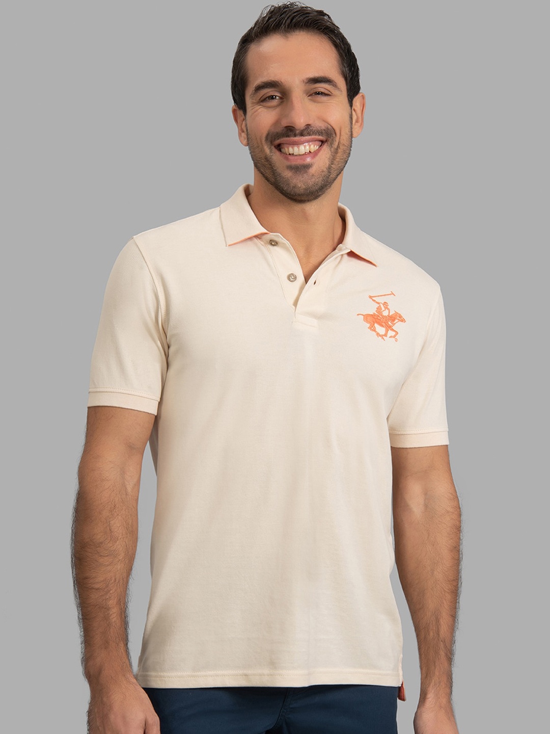 

Beverly Hills Polo Club Men Pink Solid Polo Collar T-shirt