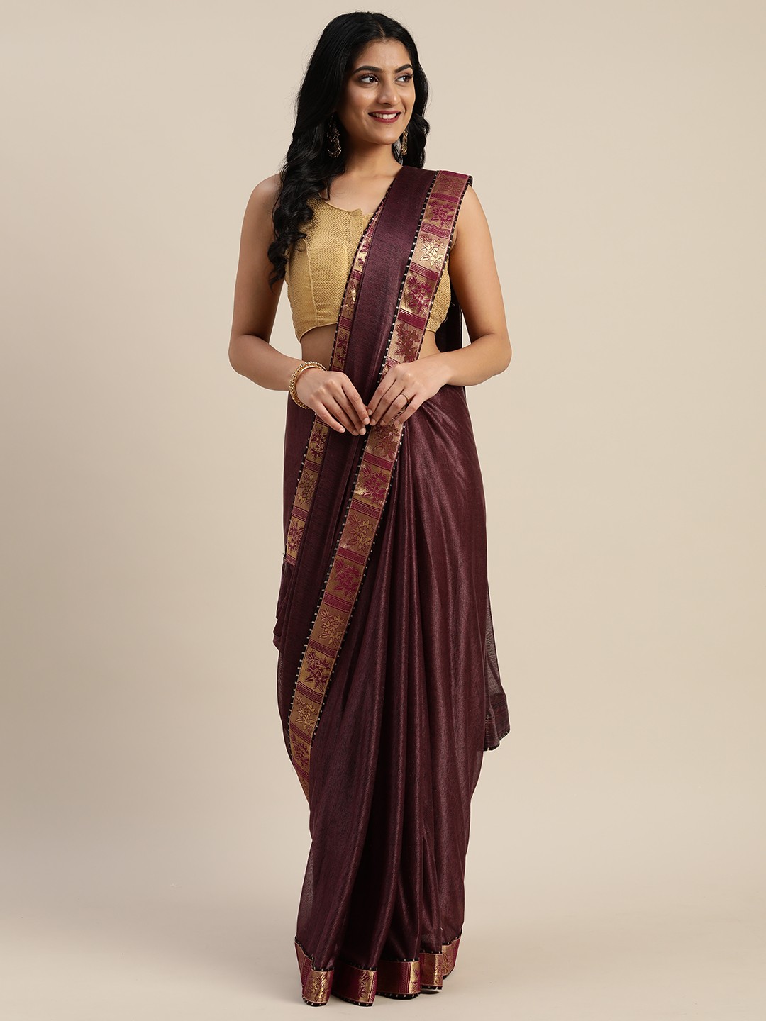 

KALINI Brown Solid Silk Blend Saree