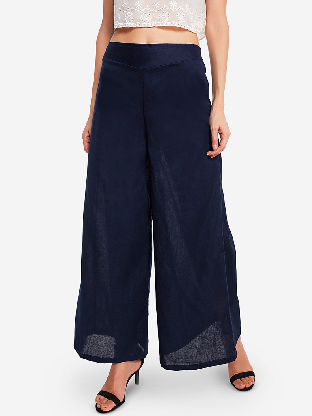 

Desi Weavess Women Navy Blue Hem Design Flared Palazzos