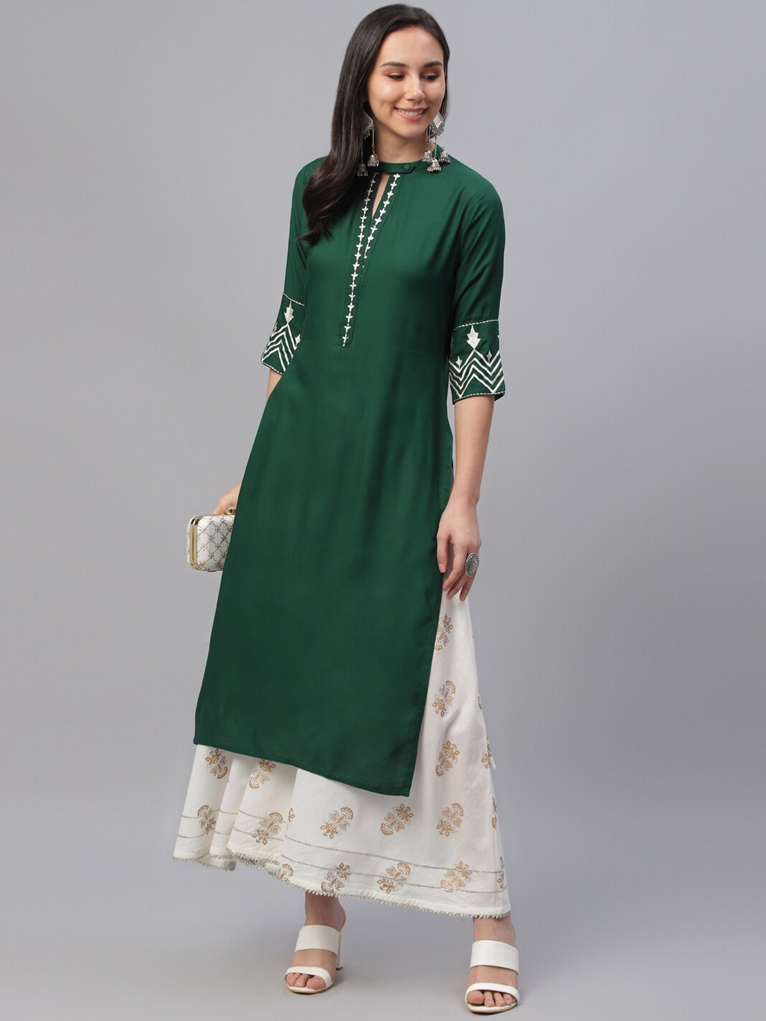 

Libas Women Green Solid Straight Kurta