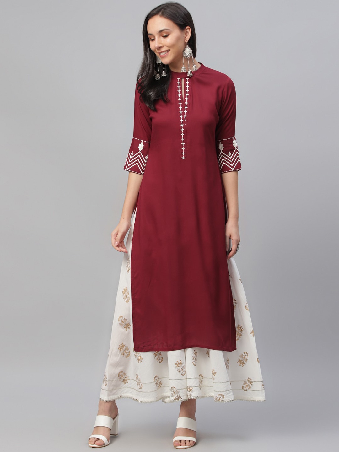 

Libas Women Maroon Embroidered Straight Kurta