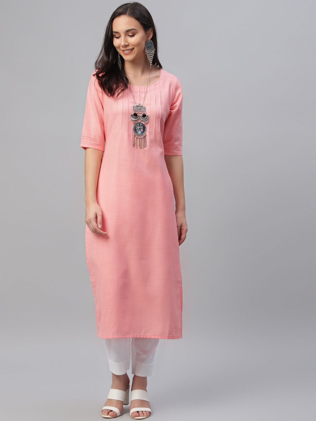 

Libas Women Pink Solid Straight Kurta