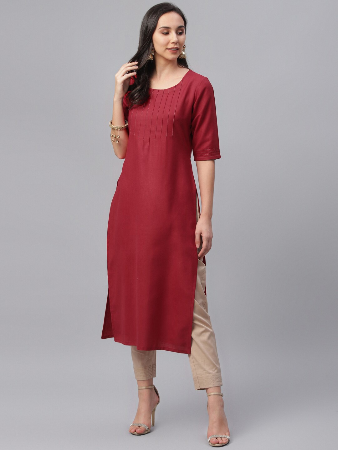 

Libas Women Maroon Solid Straight Kurta