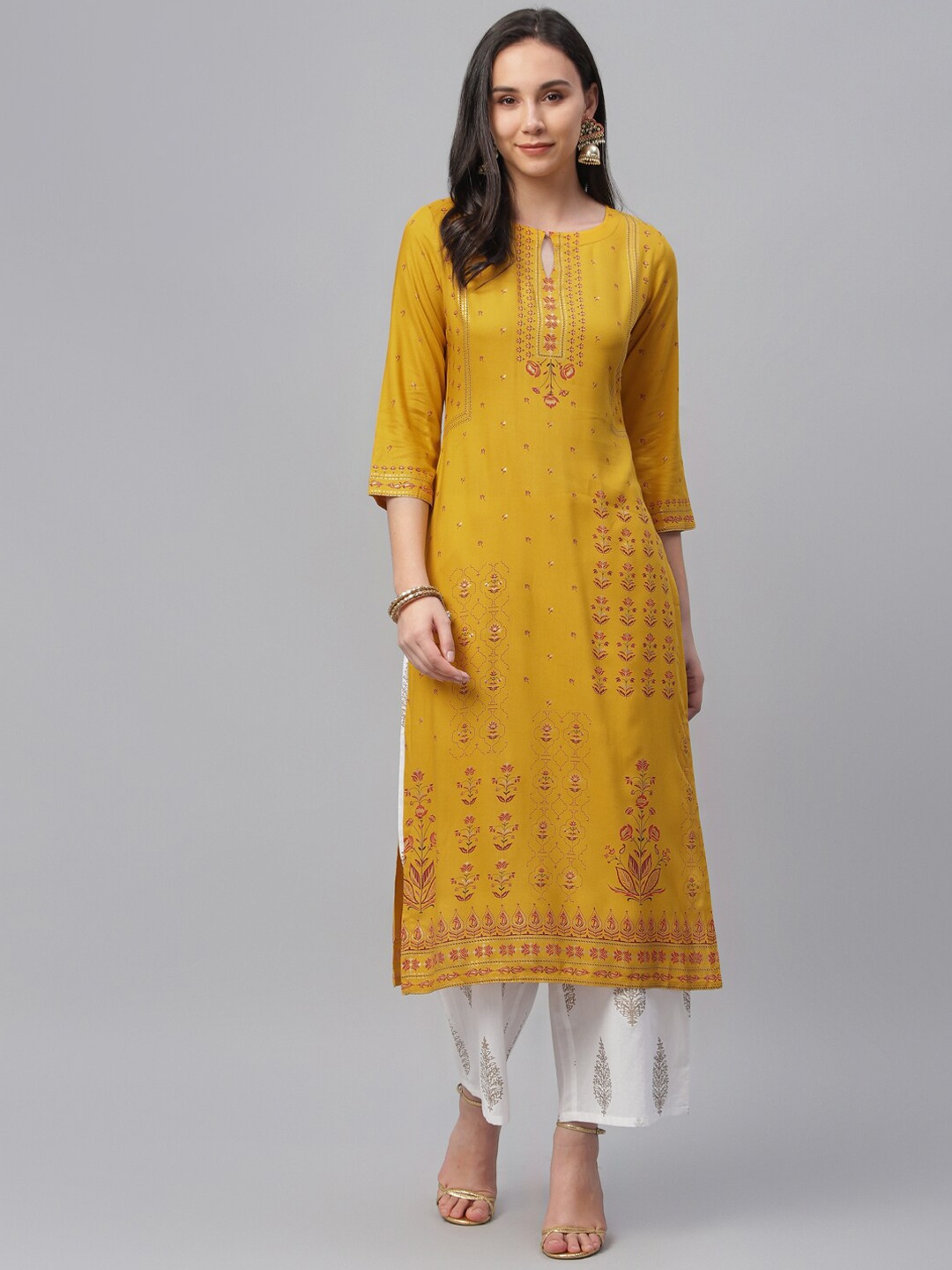 

Libas Women Yellow Printed Straight Kurta