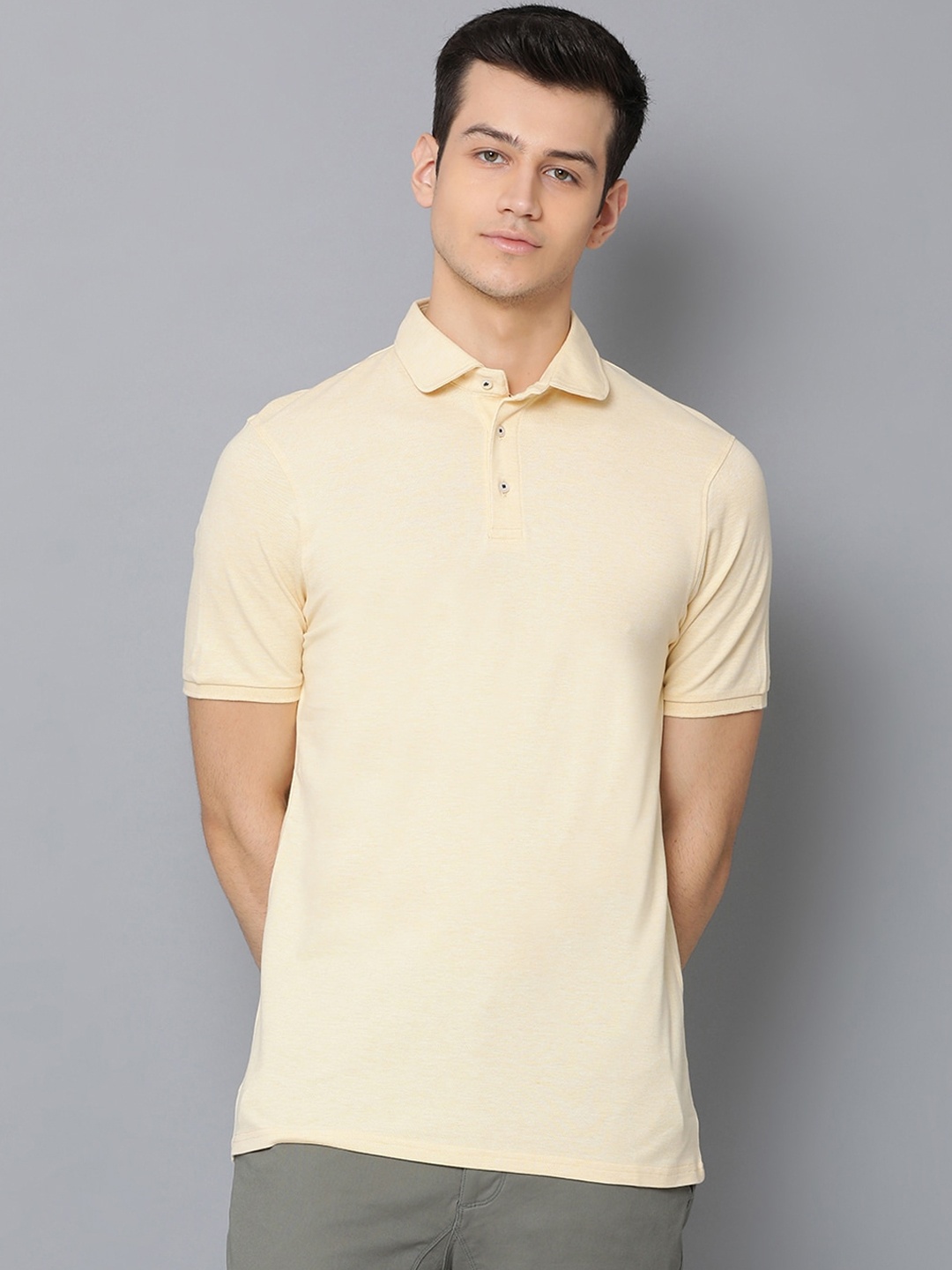 

Bruun & Stengade Men Yellow Solid Polo Collar T-shirt