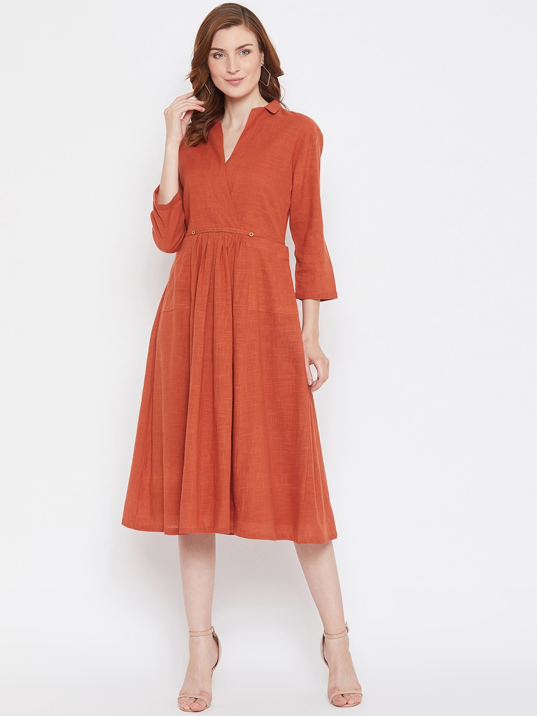 

Zastraa Women Orange Solid Wrap Dress
