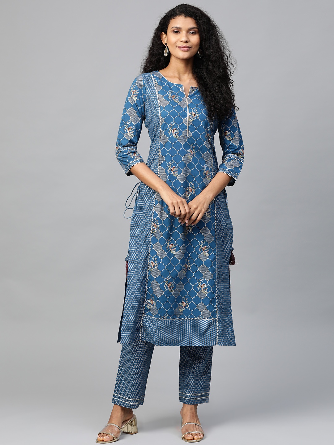 

Myshka Women Blue & Golden Printed Kurta with Trousers